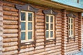 Three windows of the wooden orthodox church.