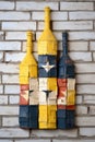 Three wine bottles stacked on top of each other. Generative AI image. Royalty Free Stock Photo