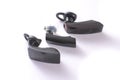 Three wireless bluetooth headsets - headphones Royalty Free Stock Photo