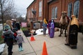 The three wisemen stand with Shadrach the camel Royalty Free Stock Photo