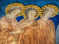 Three woman at the tomb of Jesus on Easter Sunday Royalty Free Stock Photo