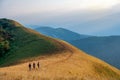 Three woman trekking on a high mountain