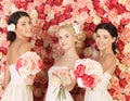 Three women with background full of roses Royalty Free Stock Photo