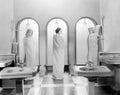 Three women in a bathroom together