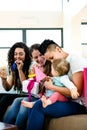 Three women celebrating a babies first birthday