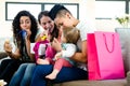 Three women celebrating a babies first birthday