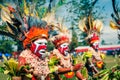 Three women in colours in Papua New Guinea