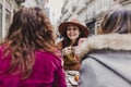 Three women friends having coffee in a terrace in Oporto, Portugal. Having a fun conversation. Lifestyle, tourism and holidays Royalty Free Stock Photo