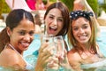 Three Women Having Party In Swimming Pool Drinking Champagne Royalty Free Stock Photo