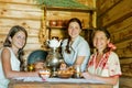 Three women having tea Royalty Free Stock Photo