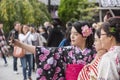 Three women in kimono taking selfie at Sensoji Buddhist temple T