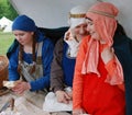 Three women in medieval costumes Royalty Free Stock Photo