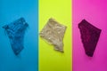 Three women panties on different colored backgrounds. Women underwears