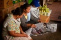 Three women reading the newspaper