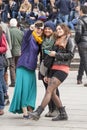 Three women smiling doing a selfie with phone