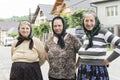 Three women on the street in Romania