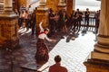 Three women in traditional costumes dance spanish flamenco on the plaza de Espana on February 2019 in Seville Royalty Free Stock Photo