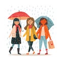 Three women walking under rain holding umbrellas, diverse females strolling together