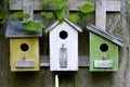 Three wooden birdhouses Royalty Free Stock Photo