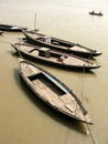 Three Wooden Boats Floating on the Water. Royalty Free Stock Photo