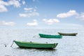 Three wooden boats at sea Royalty Free Stock Photo