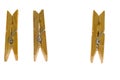 Three wooden clothes-pegs Royalty Free Stock Photo