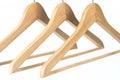 Three wooden coat / clothes hangers Royalty Free Stock Photo