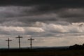 Three Wooden Crosses Stand Against Dark Ominous Storm Clouds Royalty Free Stock Photo