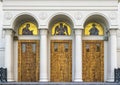 Three wooden doors to entrance of cathedral