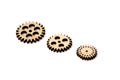 three wooden gears of different size isolated on white background Royalty Free Stock Photo