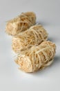 Three wooden kindling rolls  on white Royalty Free Stock Photo