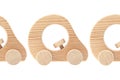 Three wooden toy cars