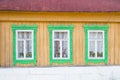 Three wooden windows on the old wall Royalty Free Stock Photo