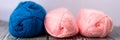 Three wool balls on the wooden background. Banner size Royalty Free Stock Photo