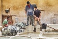 Three Workers In The Tanning Pits Royalty Free Stock Photo