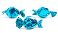 Three Wrapped Blue Candy on a White Background Royalty Free Stock Photo