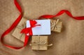 Three wrapped gifts, congratulation card