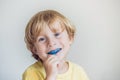 Three-year old boy shows myofunctional trainer to illuminate mouth breathing habit. Helps equalize the growing teeth and correct Royalty Free Stock Photo