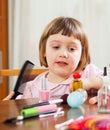 Three year old child brushing hair Royalty Free Stock Photo