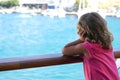 three-year-old girl admires the view of the Cyclades from the ferry Royalty Free Stock Photo