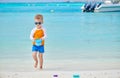 Three year old toddler playing on beach Royalty Free Stock Photo