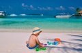 Three year old toddler playing on beach Royalty Free Stock Photo