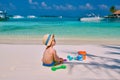 Three year old toddler playing on beach Royalty Free Stock Photo