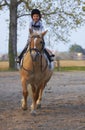 Three Years old Child ride to Pony