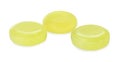 Three yellow cough drops on white background Royalty Free Stock Photo