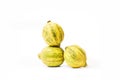 Three Yellow and green lemons on a white background Royalty Free Stock Photo