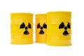 Three yellow radioactive waste drum barrels stack with warning symbol over white background Royalty Free Stock Photo