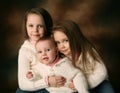 Three young beautiful sisters