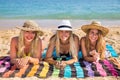 Three dutch girls sunbathing on beach Royalty Free Stock Photo