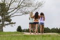 Three Young College Students Enjoying Each Others Company In Between Classes Royalty Free Stock Photo